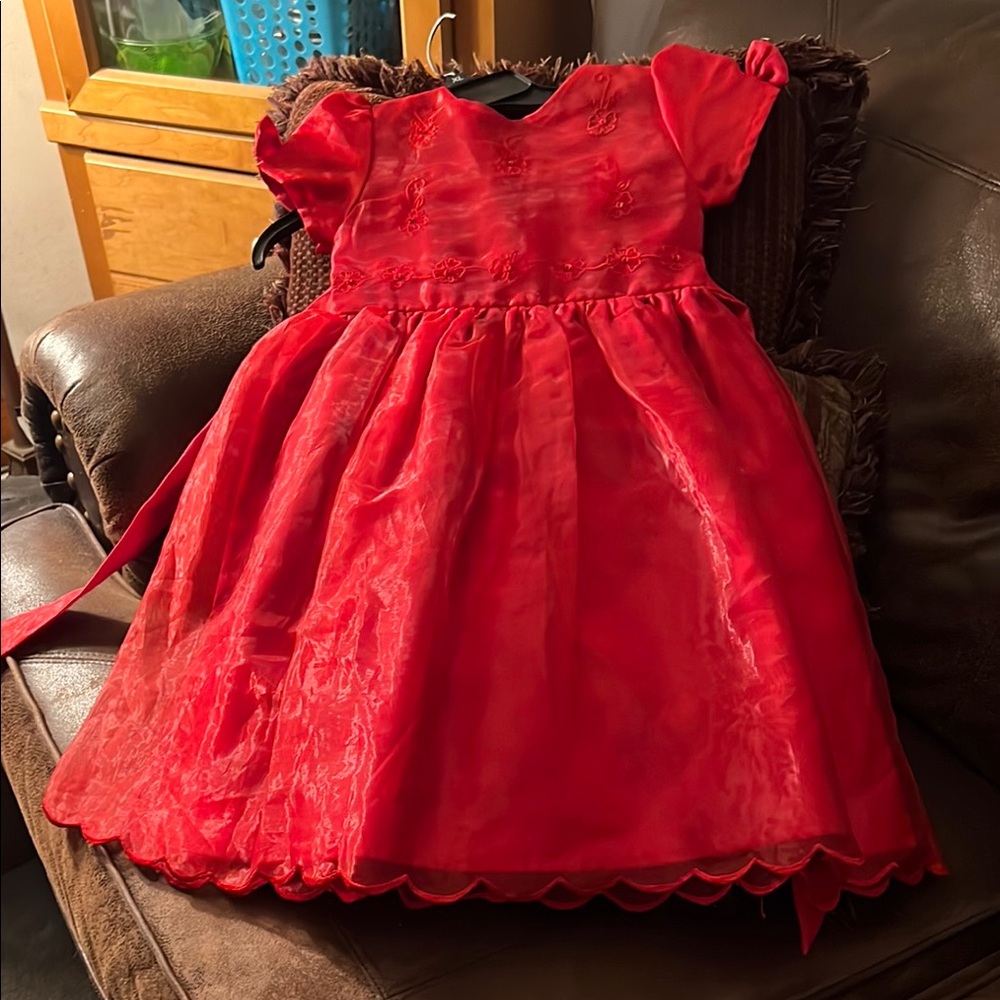 Red holiday or special occasion dress gently used excellent condition.
